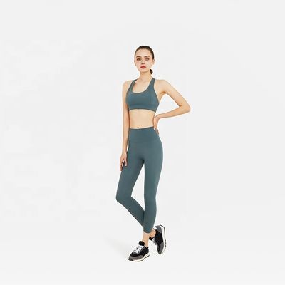 o Sportswear sem emenda de 2 mulheres do GV da parte ajusta o sutiã e o Legging da ioga